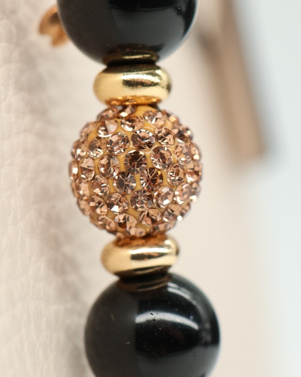 LD Keyfinder Gilded Bee Mini bracelet with black obsidian beads, gold spacers, and crystal-embellished center bead.
