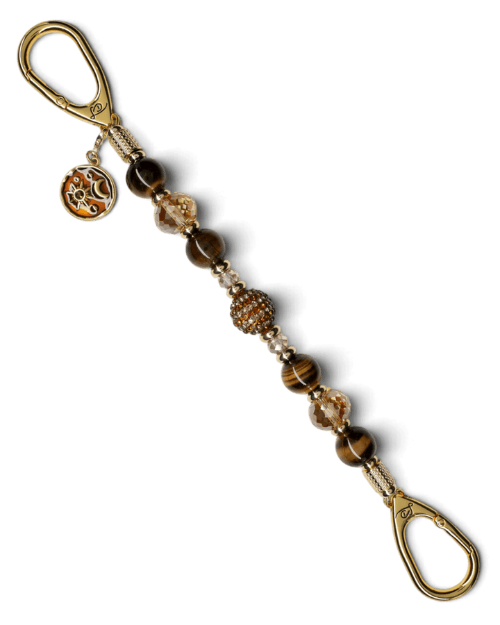 LD Keyfinder Golden Equinox beaded keychain with Tiger Eye, crystal beads, gold spacers, and a sun and moon charm.