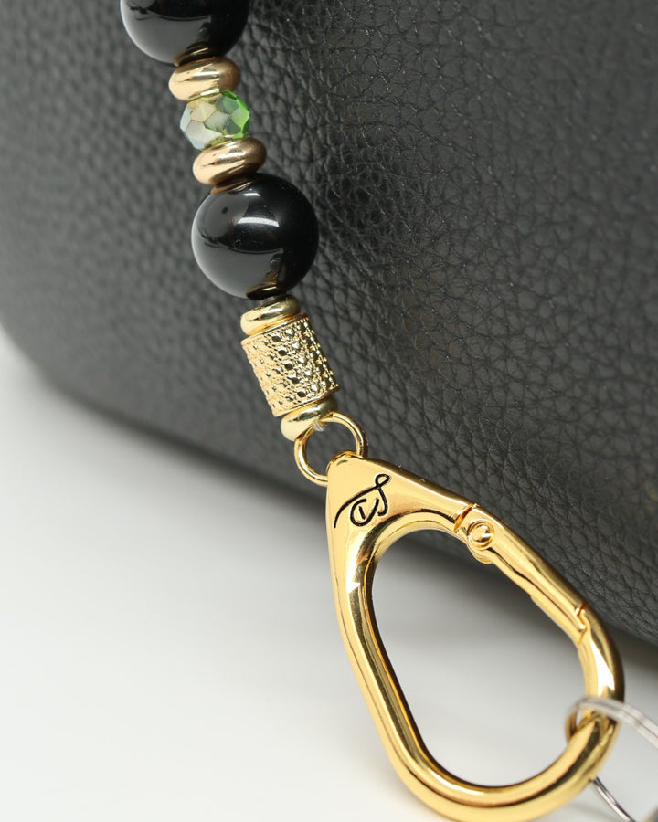 LD Keyfinder Golden Fairway beaded keychain with black obsidian, moss green crystals, and 18KT gold plated accents.