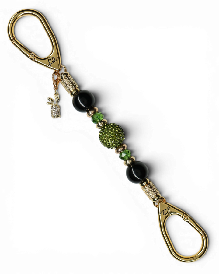 LD Keyfinder Golden Fairway Mini featuring black obsidian, moss green crystals, and a rhinestone golf bag charm.