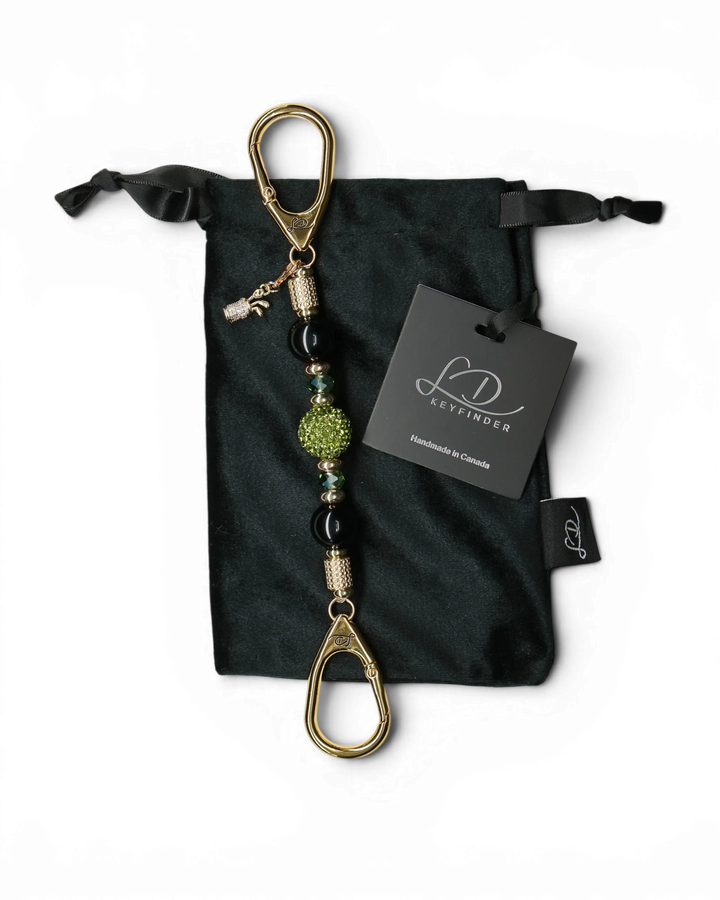 LD Keyfinder Golden Fairway Mini with obsidian, moss green crystals, 18KT gold spacers, and golf bag charm.