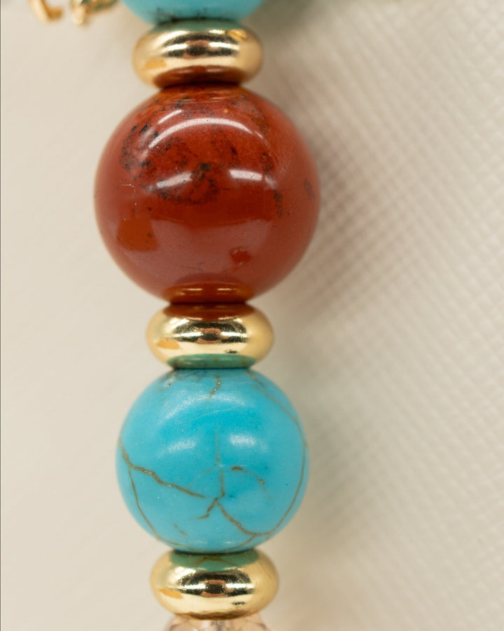 LD Keyfinder Golden Prairie beaded keychain with turquoise, red jasper, gold beads, horse, and horseshoe charms.