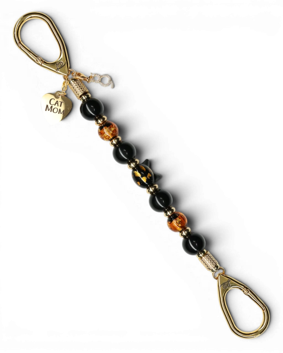 LD Keyfinder Golden Purrs beaded keychain with black obsidian, gold foil lampwork glass, and a Cat Mom heart charm.