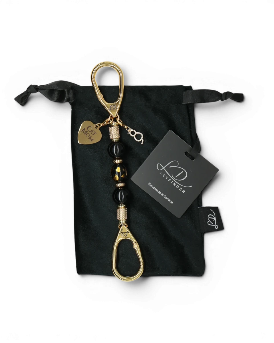 LD Keyfinder Golden Purrs-Mini keychain with black obsidian beads, gold cat charm, and Cat Mom heart on velvet pouch.