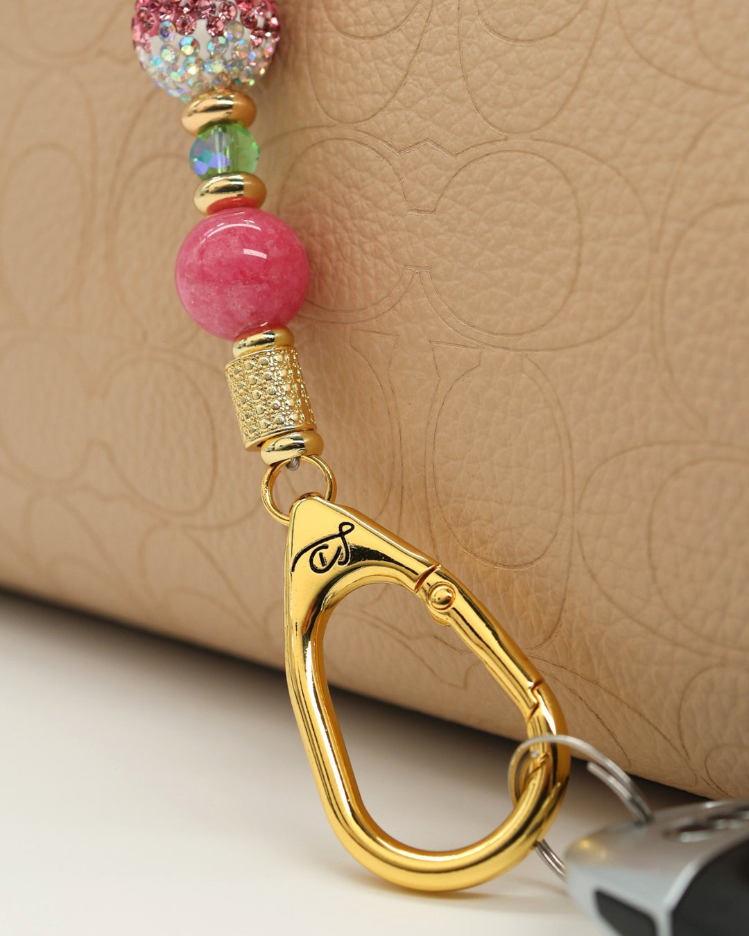 LD Keyfinder Golden Rally Mini with lime green glass, violet red jade, and crystal beads with a pickleball charm.
