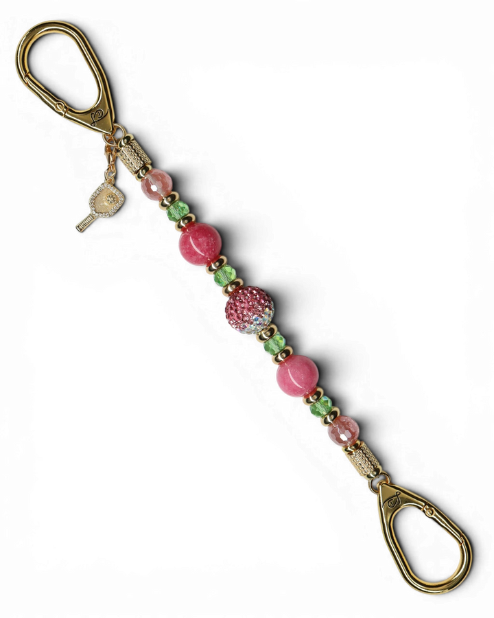 LD Keyfinder Golden Rally beaded keychain with pink quartz, lime green glass, and a rhinestone pickleball paddle charm.