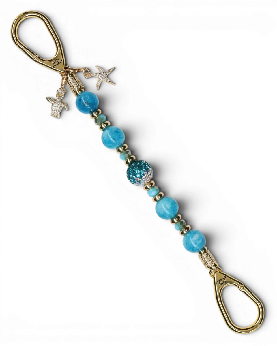 LD Keyfinder Golden Reef keychain with aqua hemimorphite beads, Austrian crystal, gold-plated charms of starfish and sea turtle.