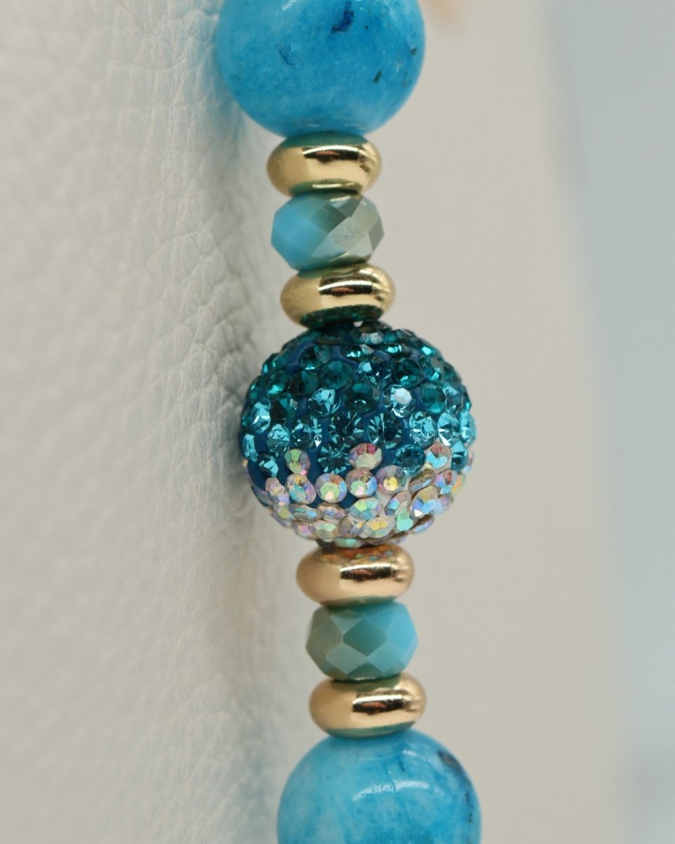 LD Keyfinder Golden Reef necklace with aqua hemimorphite beads, gold spacers, and a crystal disco ball bead.