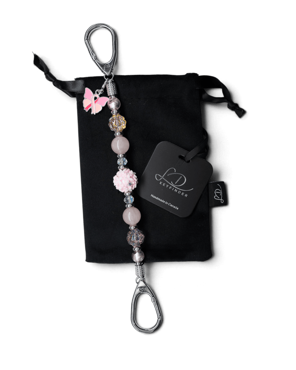 LD Keyfinder Hope Blooms beaded keychain with rose quartz, pink flower beads, and a pink ribbon butterfly charm.