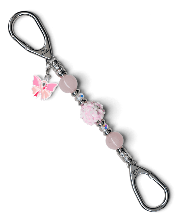 LD Keyfinder Hope Blooms Mini with rose quartz beads, iridescent glass, clay butterfly, and pink ribbon charm.