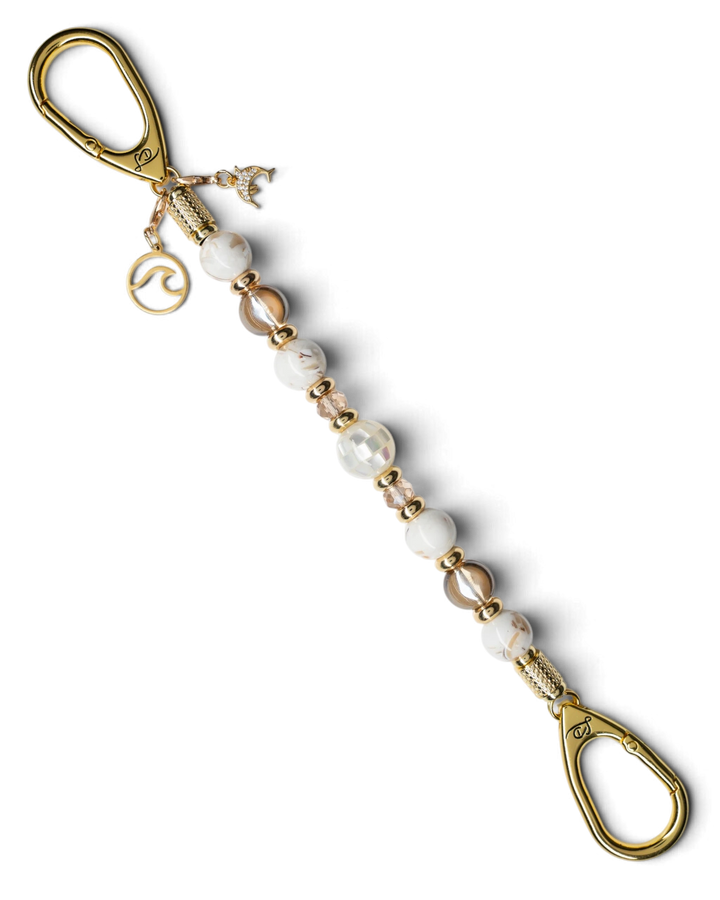 LD Keyfinder Mediterranean Glow beaded key holder with Mother of Pearl, ivory shells, gold beads, and ocean charms.