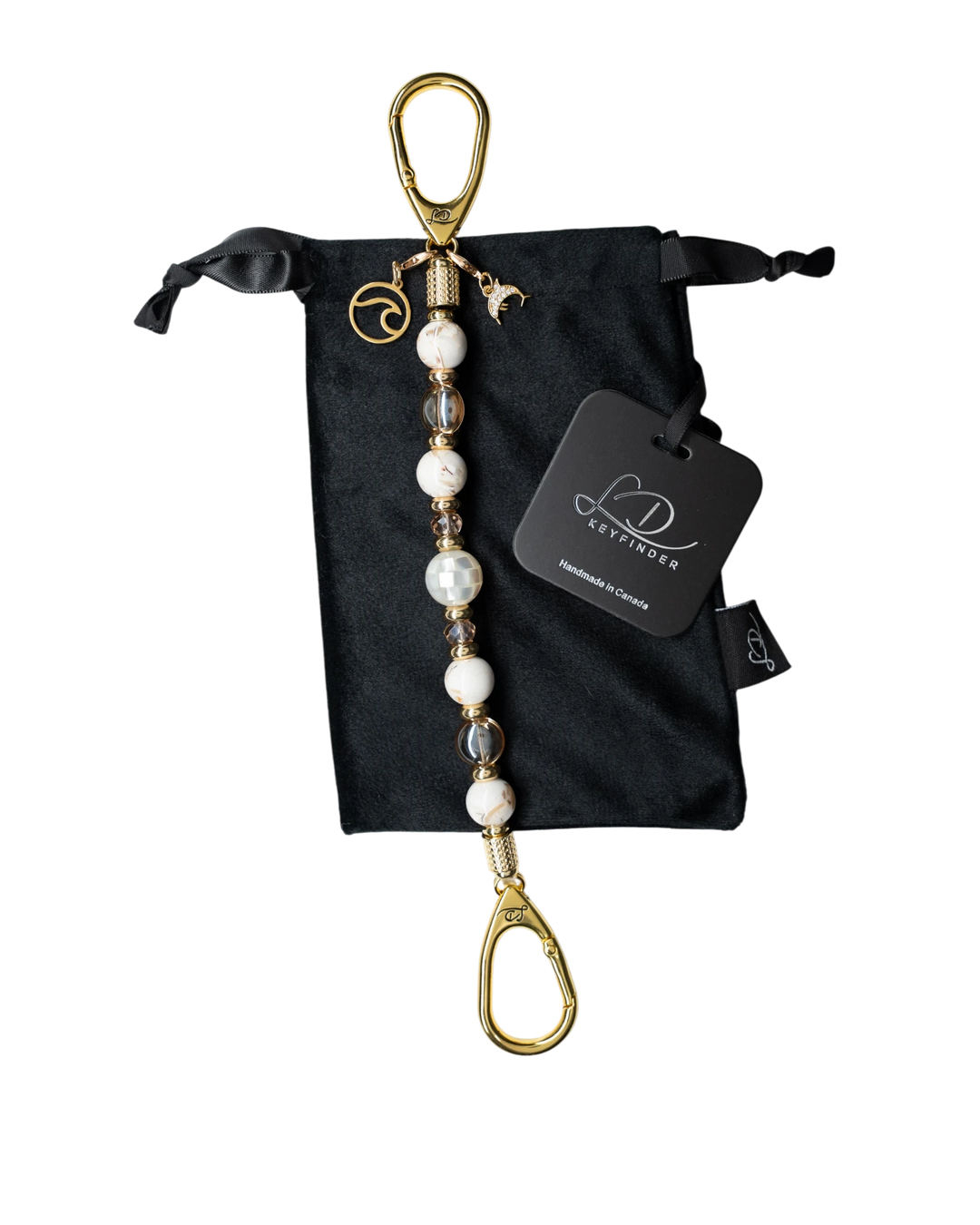 LD Keyfinder Mediterranean Glow beaded keychain with Mother of Pearl, ivory shells, gold beads, and ocean charms.