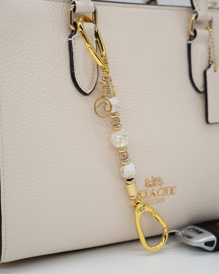 LD Keyfinder Mediterranean Glow-Mini featuring Mother of Pearl, ivory shell beads, gold accents, and ocean charms.