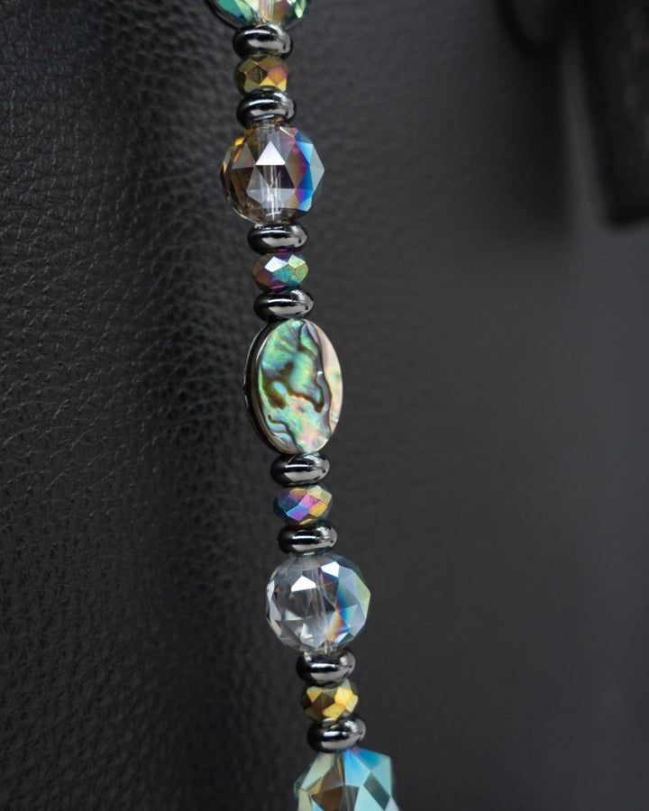 LD Keyfinder Midnight Aurora beaded accessory featuring an iridescent abalone shell bead and rainbow crystal glass