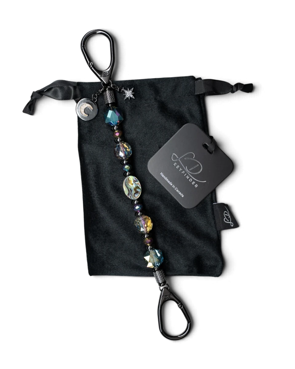 LD Keyfinder Midnight Aurora beaded keychain with iridescent abalone, rainbow crystal beads, and moon and star charms.