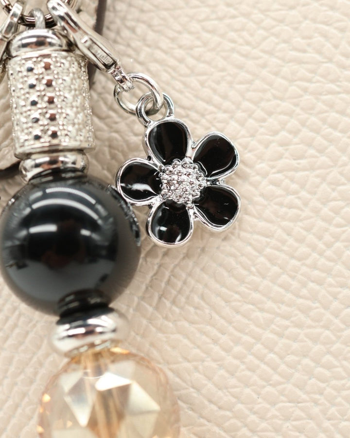LD Keyfinder Midnight Hive keychain with black obsidian, crystal bead, and rhinestone bumblebee charm.