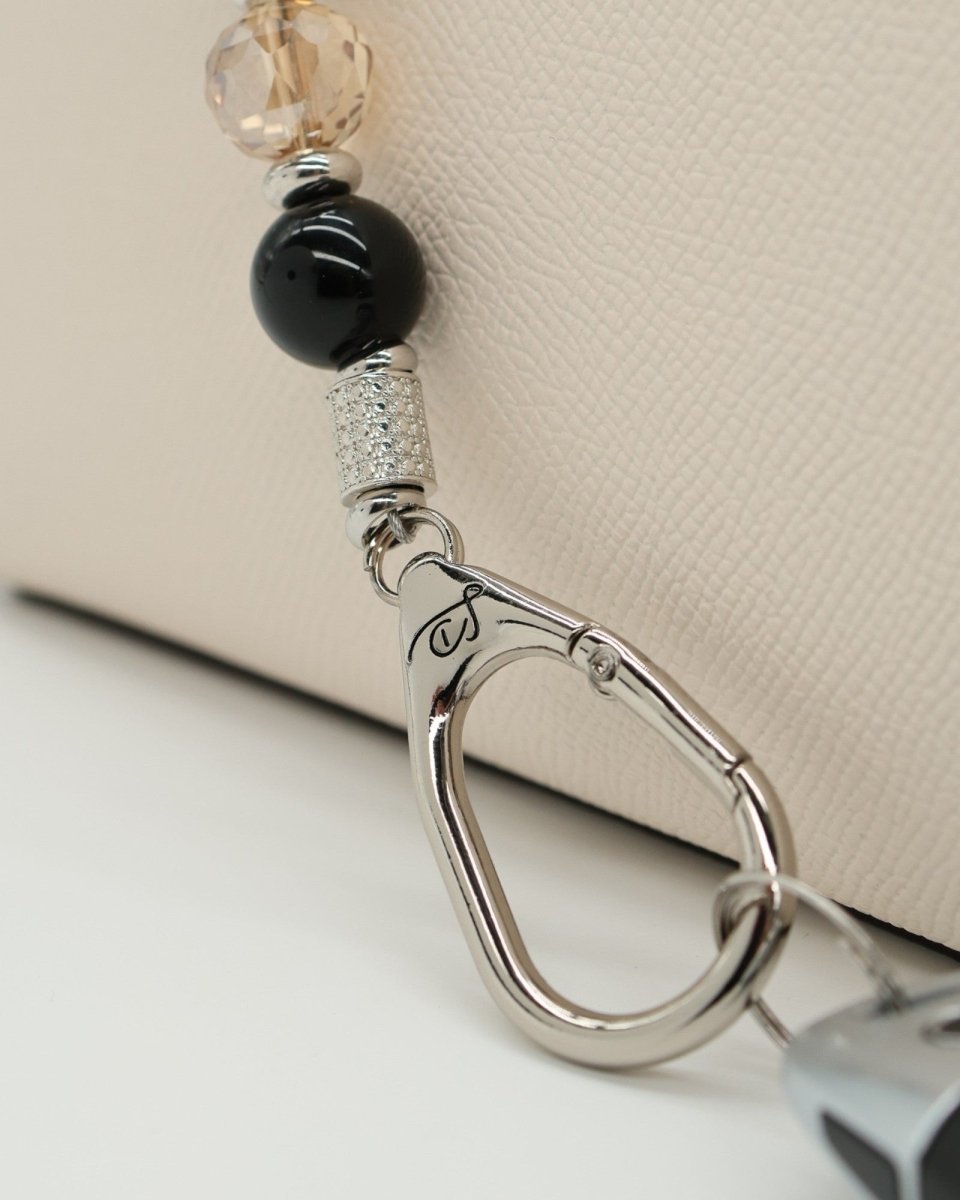 LD Keyfinder Midnight Hive lanyard with black obsidian beads, crystal bead, and silver-tone clasp.