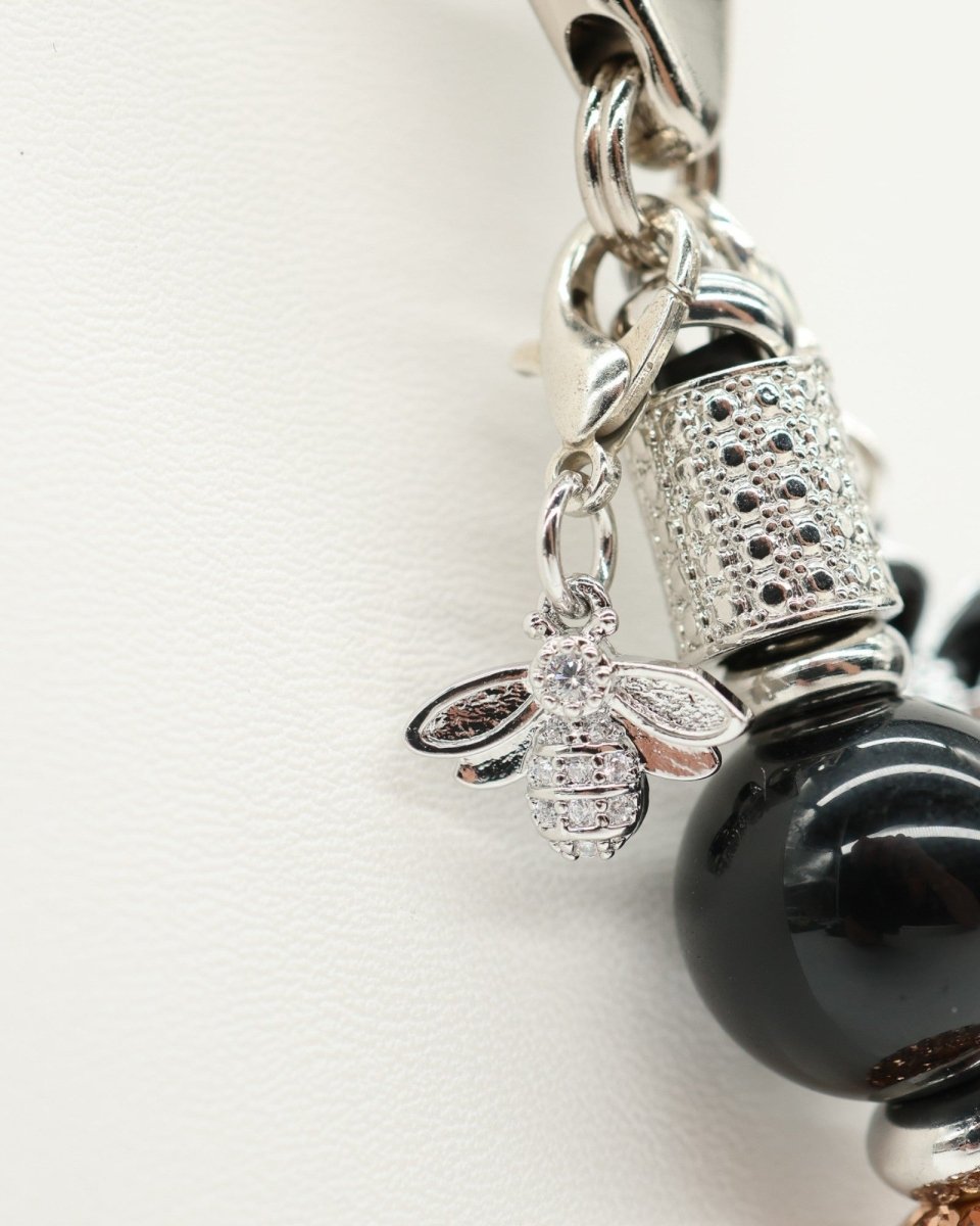LD Keyfinder Midnight Hive Mini keychain with black obsidian beads, rhinestone bee charm, and crystal-embellished bead.
