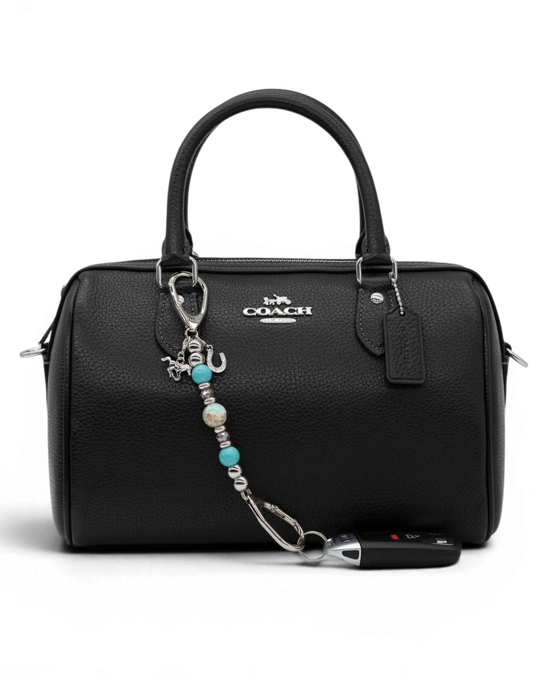 LD Keyfinder Mini Cowgirl Dreams western charm with turquoise, jasper, and horse charms clipped to a black handbag.