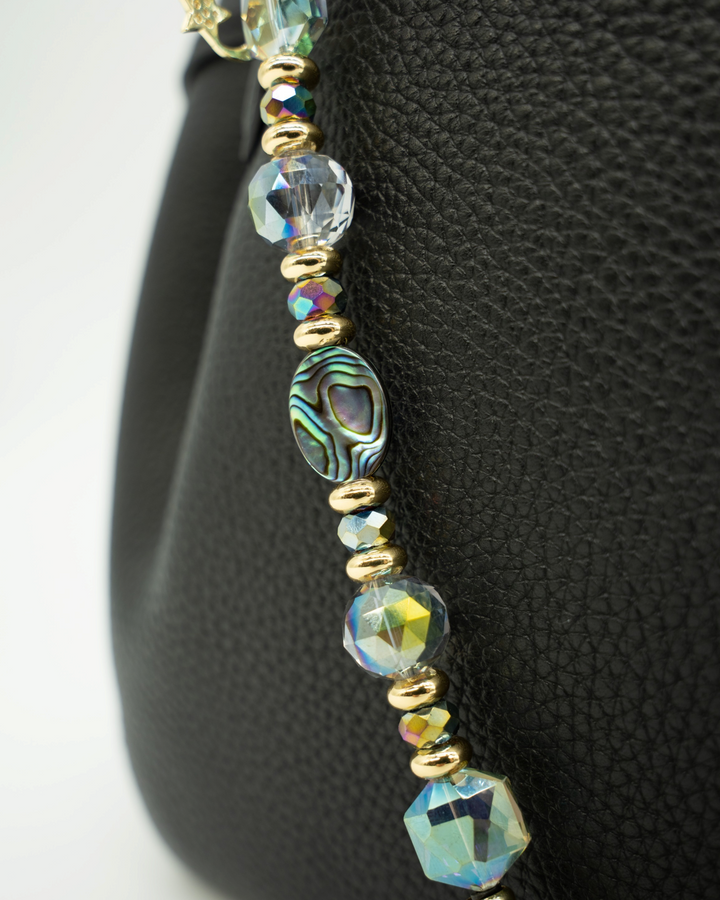 LD Keyfinder Northern Lights beaded charm with abalone shell, rainbow crystal beads, and gold-plated moon star charm.