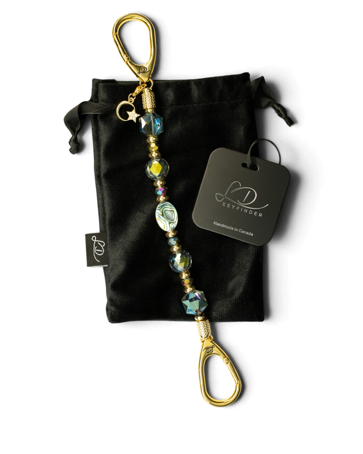LD Keyfinder Northern Lights beaded keychain with abalone shell, rainbow crystal beads, and gold moon and star charm.