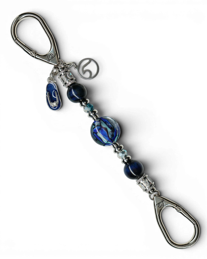 LD Keyfinder Ocean Mosaic Petite featuring artisan blue glass, tiger eye beads, and ocean-themed charms on silver clips.