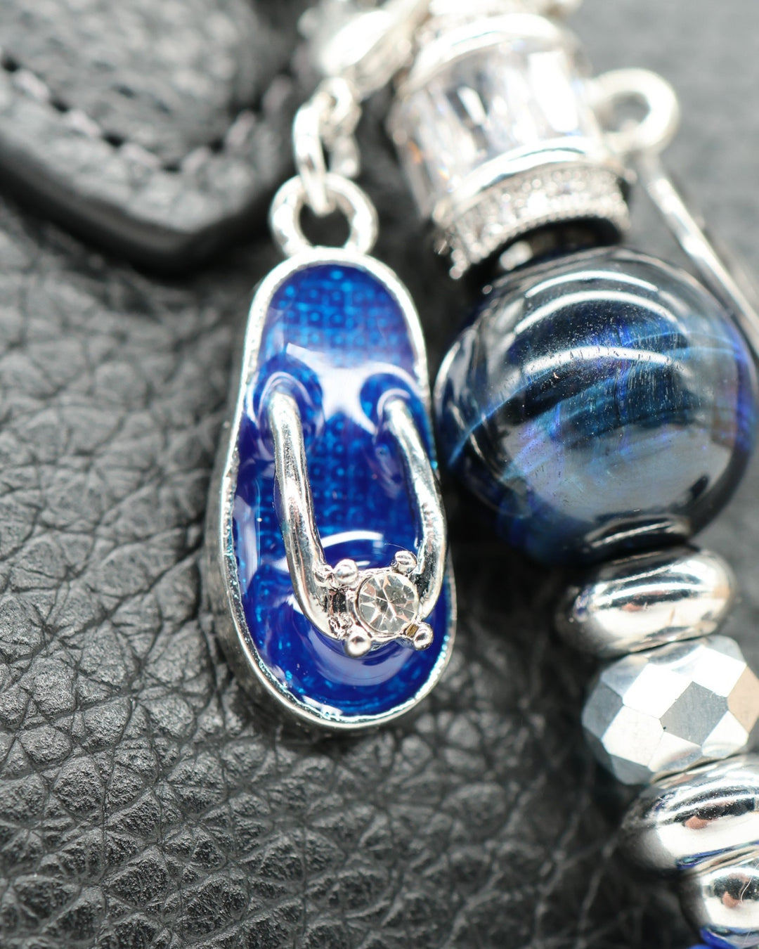 LD Keyfinder Ocean Mosaic Petite featuring a blue flip-flop charm, tiger eye gemstone, and artisan glass beads.