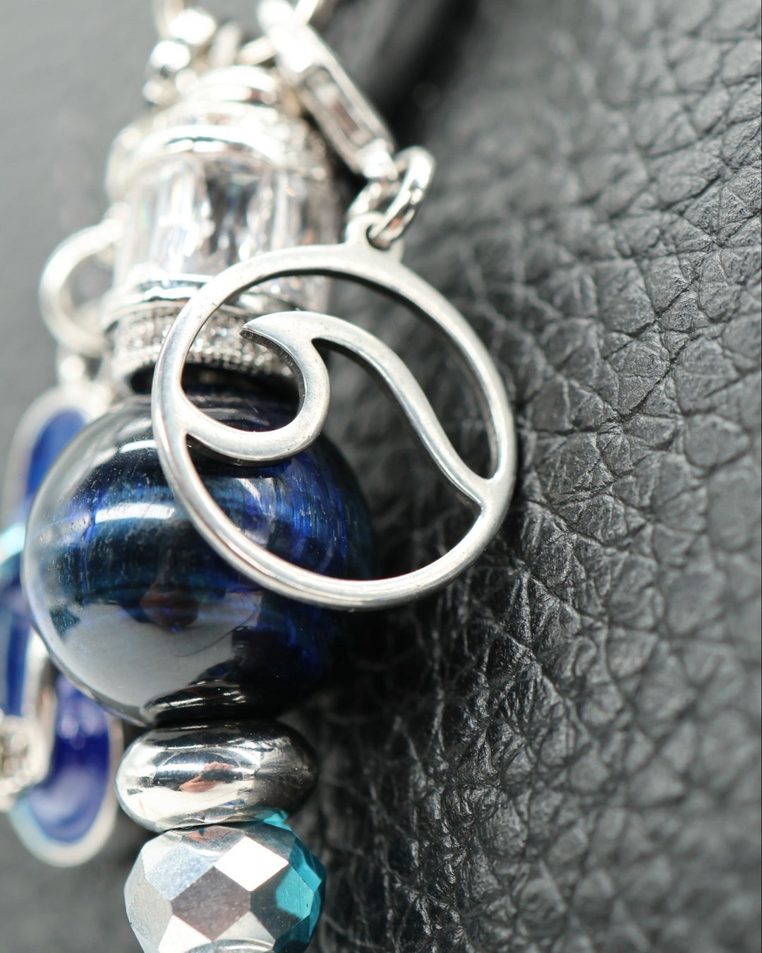 LD Keyfinder Ocean Mosaic Petite featuring a blue tiger eye bead, ocean wave charm, and silver-plated accents.