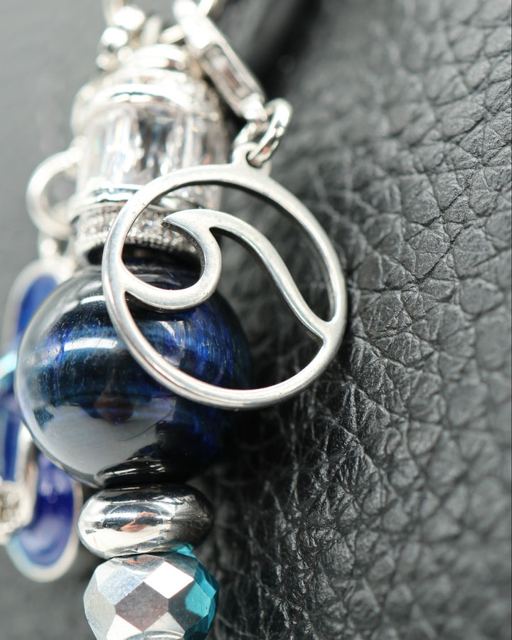 LD Keyfinder Ocean Mosaic Petite featuring a blue tiger eye bead, ocean wave charm, and silver-plated accents.