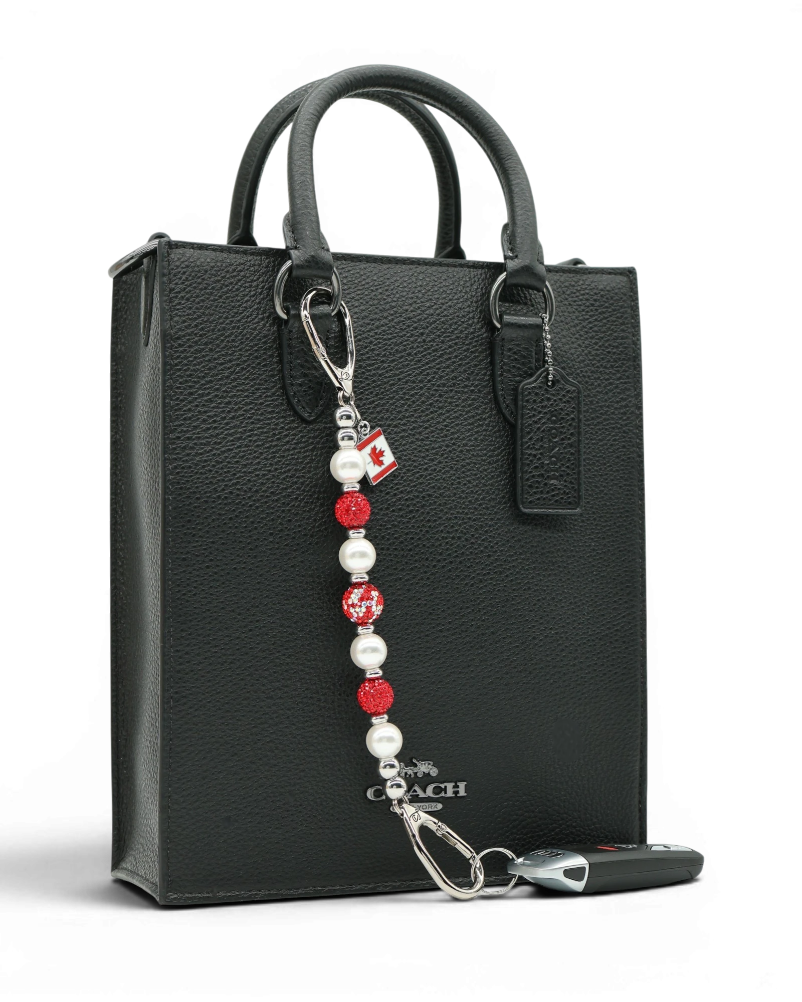 LD Keyfinder Oh Canada Shimmer keychain with red crystal, pearl, and glitter beads, and a Canada flag charm.
