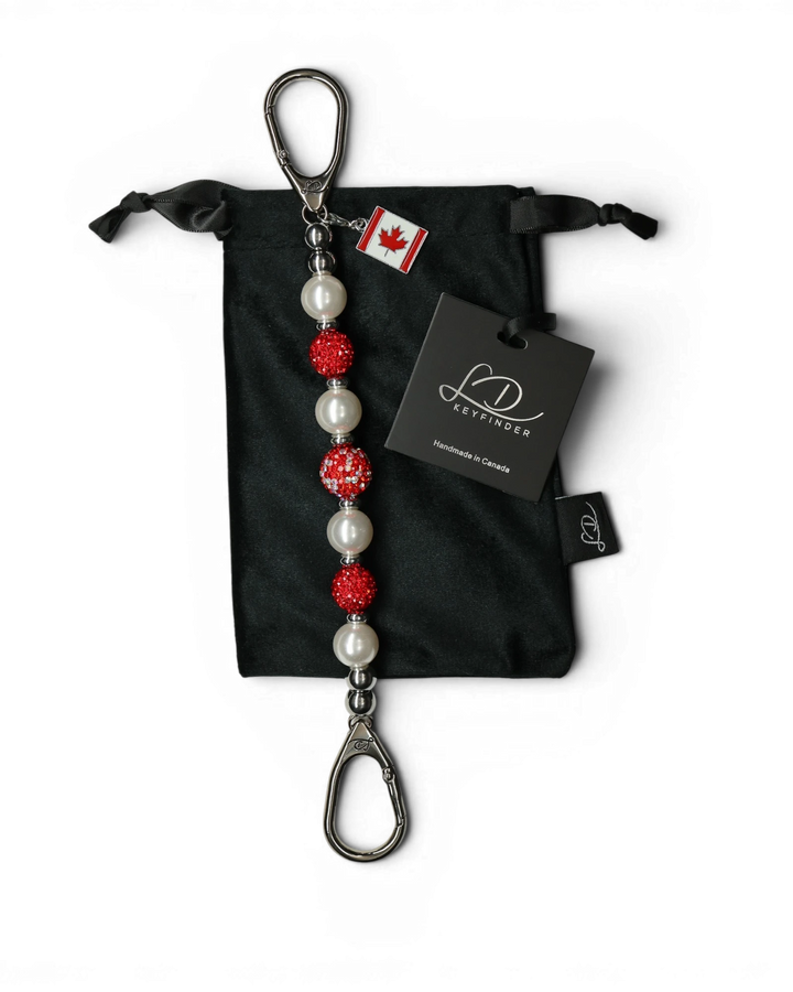 LD Keyfinder Oh Canada Shimmer keychain with red crystal, pearl, and sparkly red beads, and a Canada flag charm.