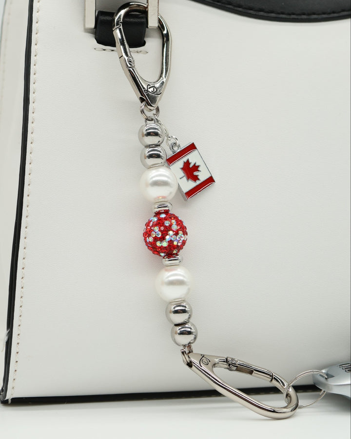 LD Keyfinder Oh Canada Shimmer Mini keychain with white pearls, red crystal bead, and Canada flag charm.