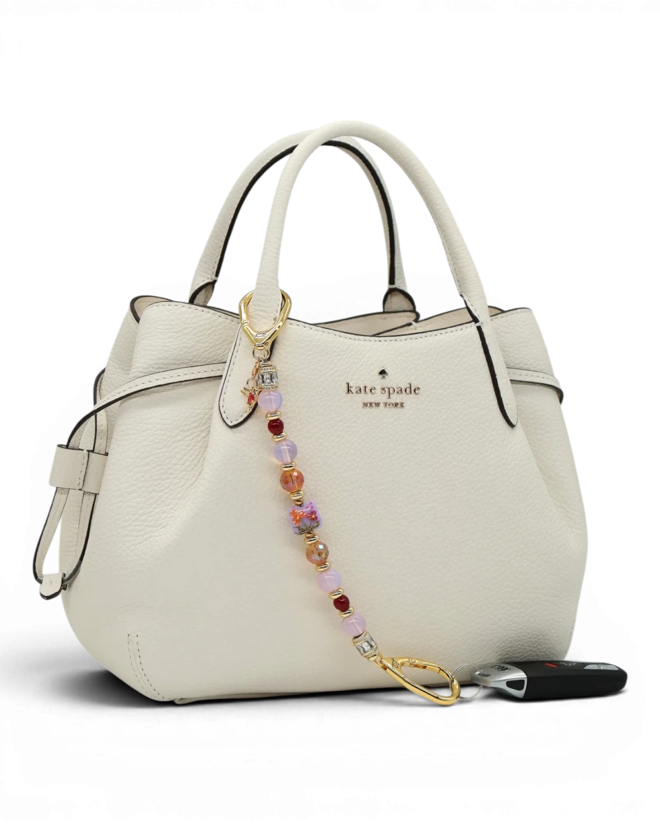 LD Keyfinder Opalite Bloom charm with pink opalite, ruby, and etched glass beads, and hummingbird charm.