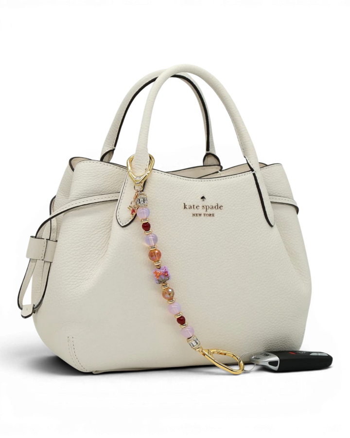 LD Keyfinder Opalite Bloom charm with pink opalite, ruby, and etched glass beads, and hummingbird charm.