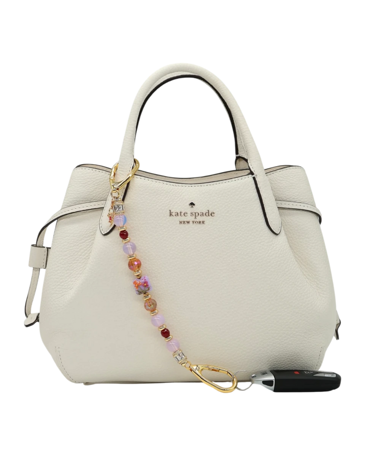 LD Keyfinder Opalite Bloom charm with pink opalite, ruby, and etched glass beads, and hummingbird charm.