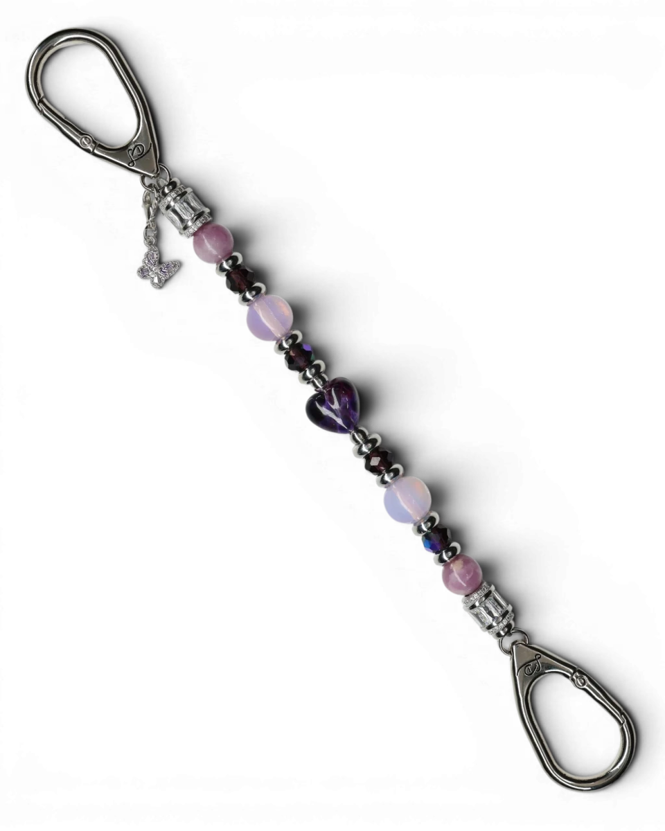 LD Keyfinder Orchid Flutter beaded accessory with lepidolite, opalite, glass beads, and a purple butterfly charm.