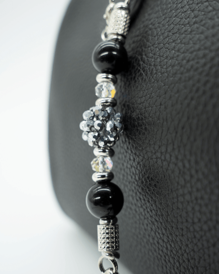 LD Keyfinder Owl That Glitters Mini featuring black obsidian, iridescent glass, and slate grey beads with platinum.