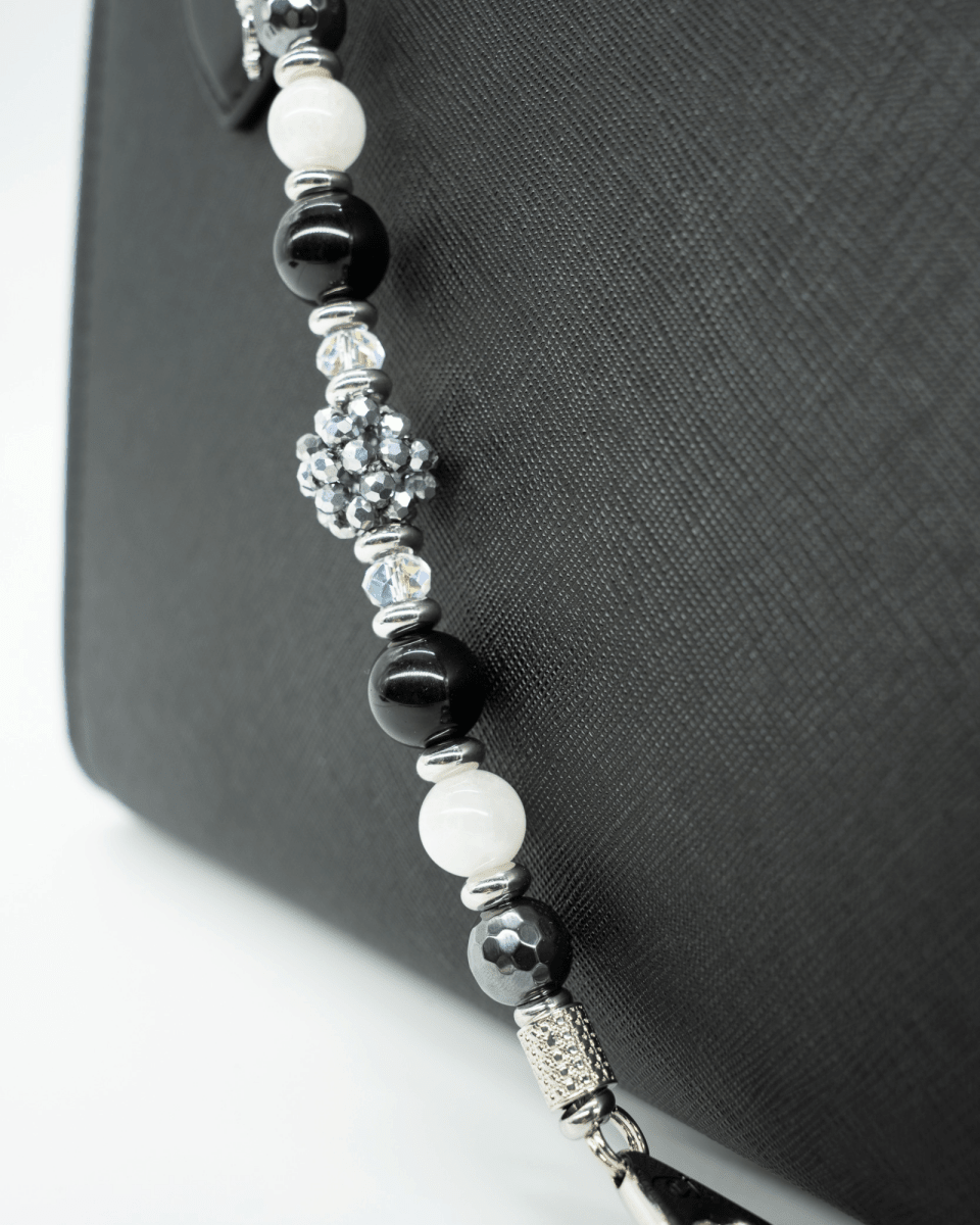 LD Keyfinder Owl That Glitters featuring black obsidian, white moonstone, hematite, and iridescent glass beads.