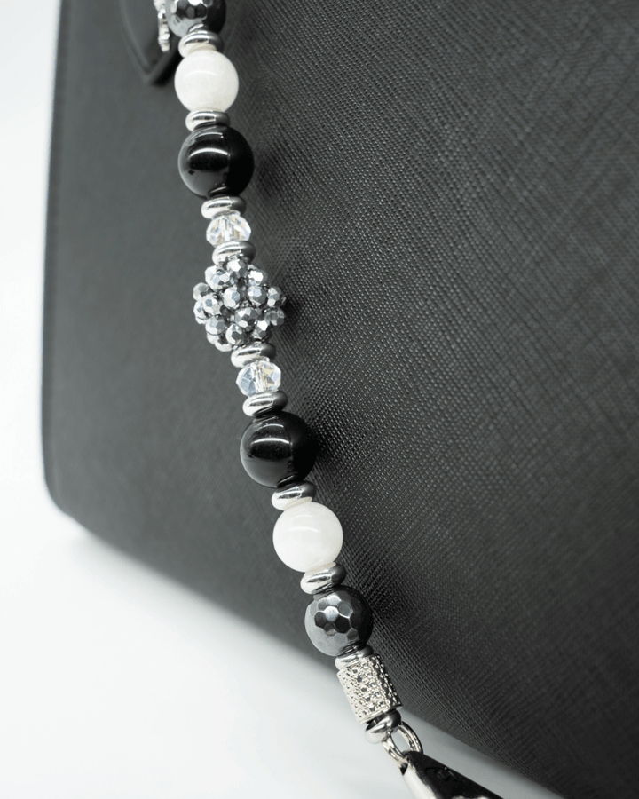 LD Keyfinder Owl That Glitters featuring black obsidian, white moonstone, hematite, and iridescent glass beads.