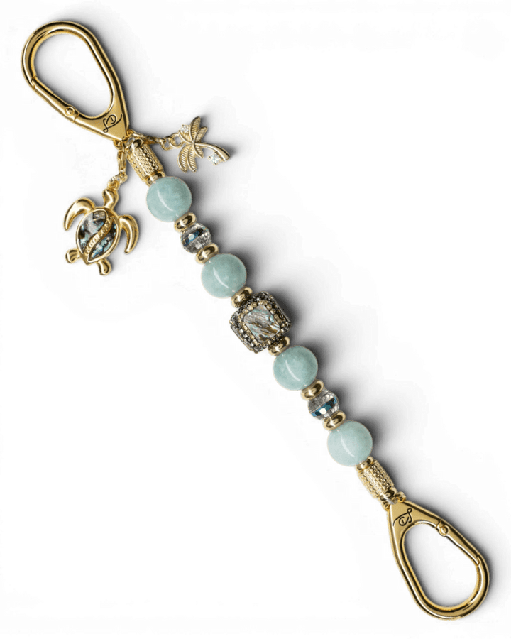 LD Keyfinder Paua Paradise key finder with aqua jade beads, paua shell turtle charm, and gold-plated accents.