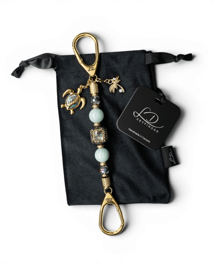 LD Keyfinder Paua Paradise-Mini featuring aqua Malaysian Jade, paua shell, turtle charm, and gold-plated accents.