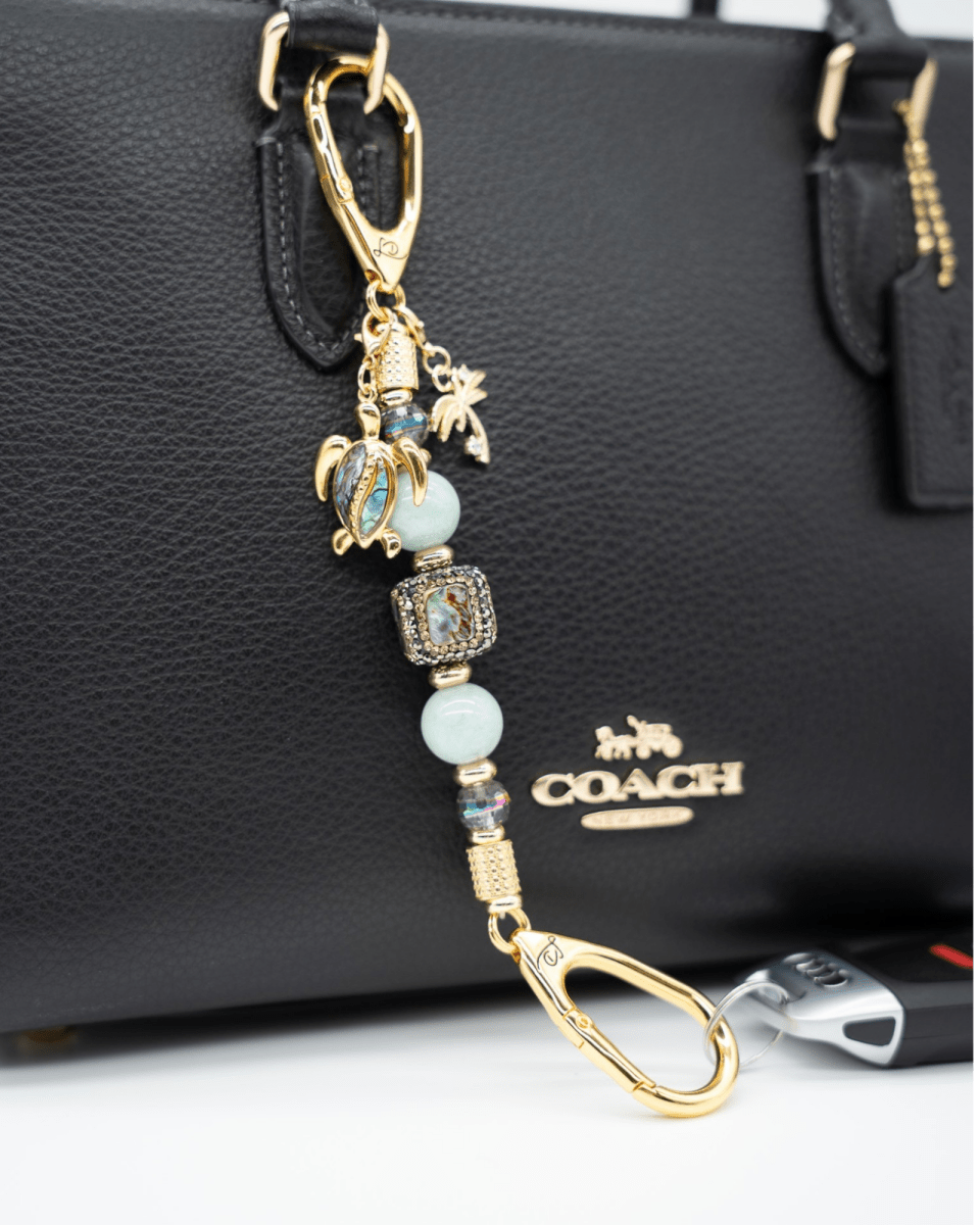 LD Keyfinder Paua Paradise-Mini featuring aqua Malaysian Jade, paua shell, turtle charm, and gold-plated accents.