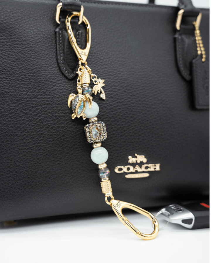LD Keyfinder Paua Paradise-Mini featuring aqua Malaysian Jade, paua shell, turtle charm, and gold-plated accents.