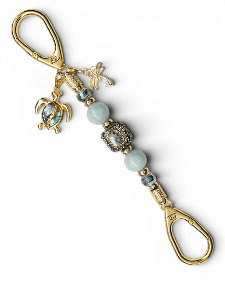 LD Keyfinder Paua Paradise Mini keychain with aqua Malaysian jade, paua shell, turtle charm, and gold-plated accents.