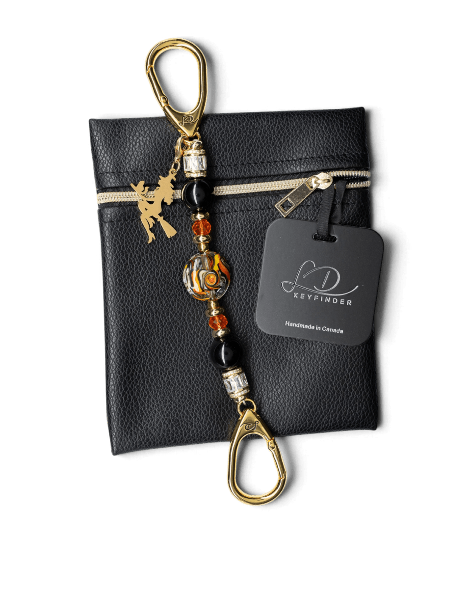 LD Keyfinder Petite Bewitched Halloween accessory with black obsidian, orange glass beads, and a gold witch charm.