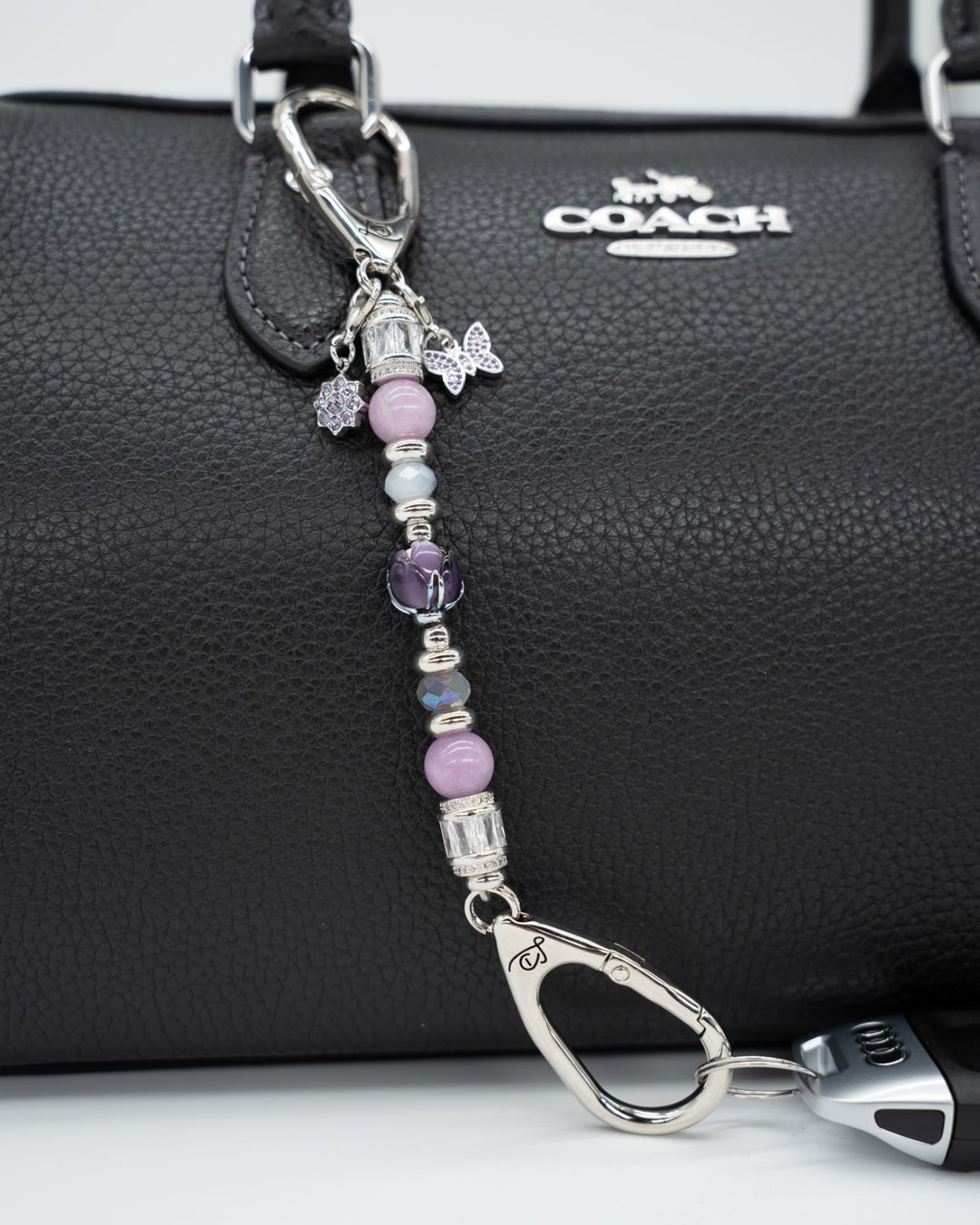 LD Keyfinder Petite Blooming Joy accessory with lavender Lepidolite, purple Jade, glass tulip, and butterfly charms.