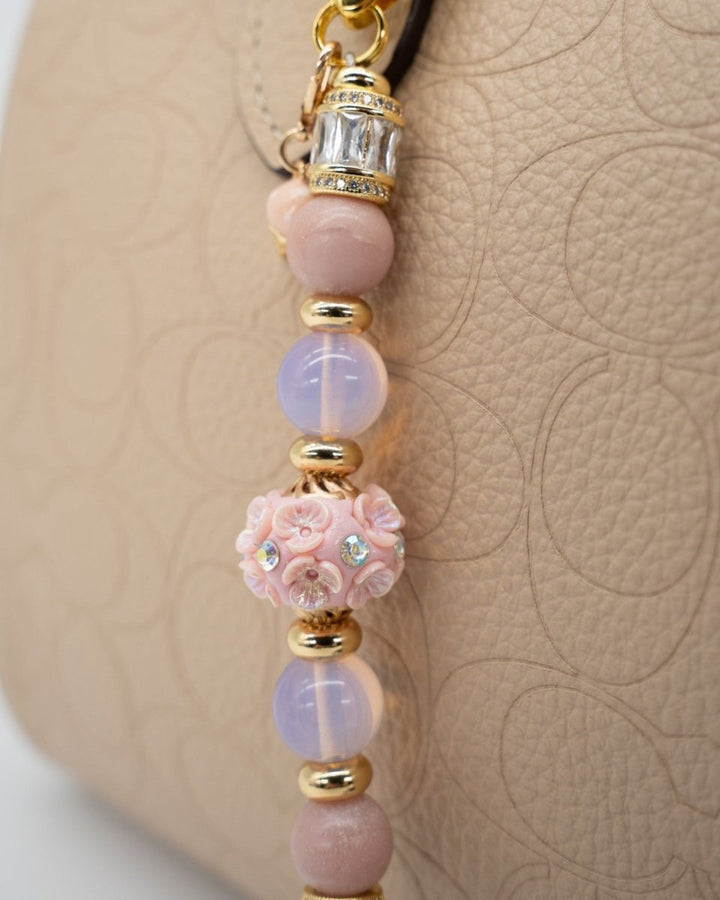 LD Keyfinder Petite Blush Sorbetto featuring pink opal, iridescent beads, floral artisan centerpiece, and gold charm.