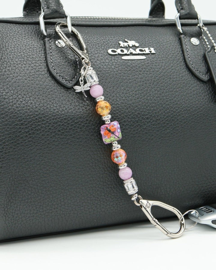 LD Keyfinder Petite Dragonfly Magic keychain with purple lepidolite, orange glass beads, and a lampwork dragonfly centerpiece.