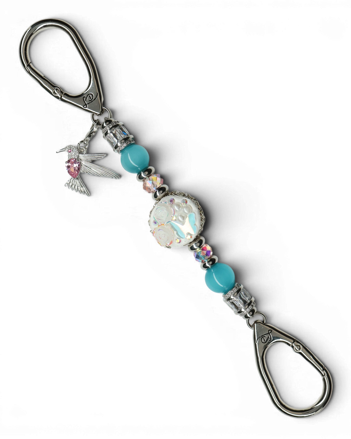 LD Keyfinder Petite Garden Serenade featuring aqua cat's eye beads, pink glass, artisan clay flower bead, and hummingbird
