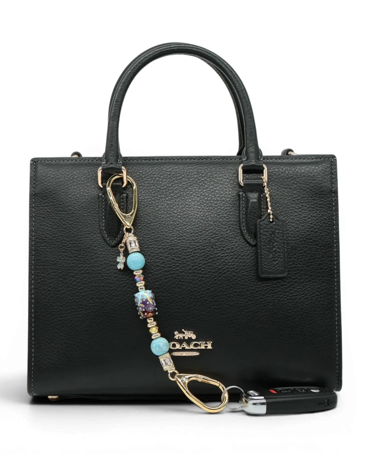 LD Keyfinder Petite Gilded Fantasy keychain with blue, gold, and topaz glass beads and a blue flower charm.